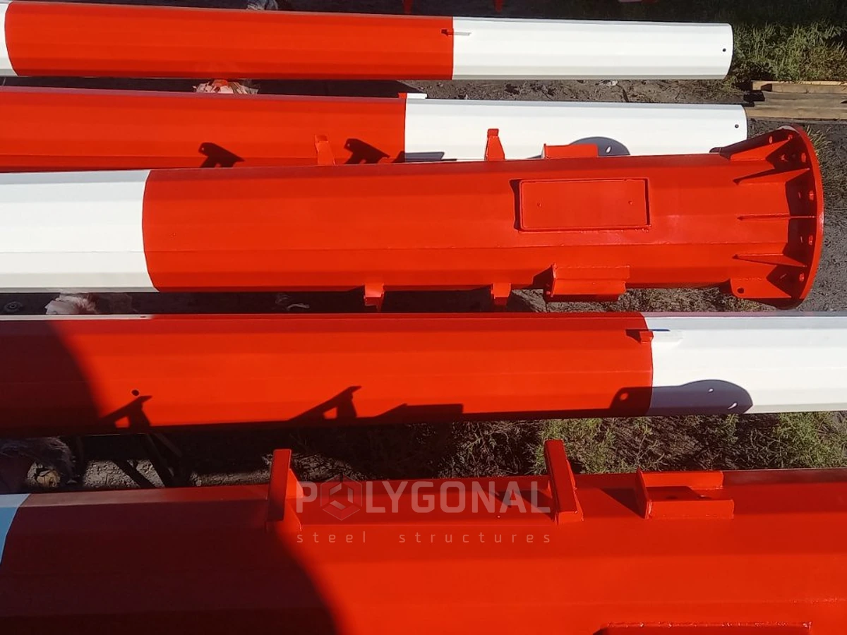 Floodlight mast sections with red-and-white signal painting
