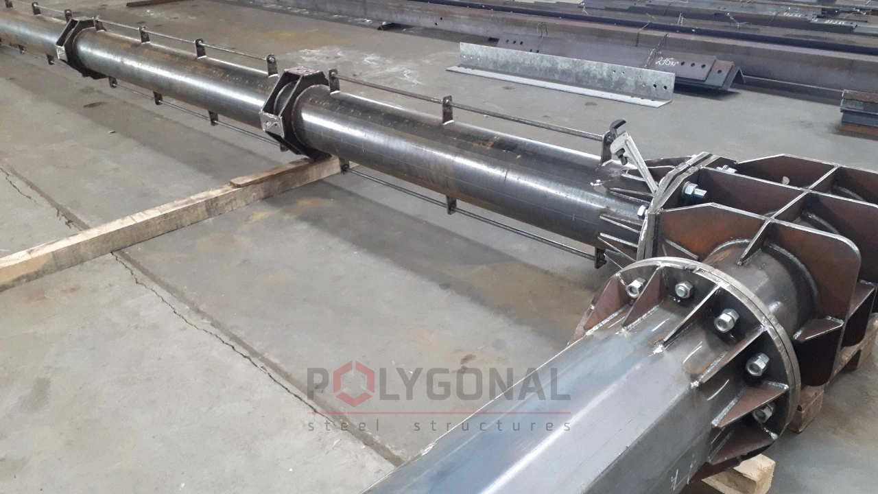 Control assembly of a 150 kV switchyard gantry in the workshop: the crossarm and its joint with the post