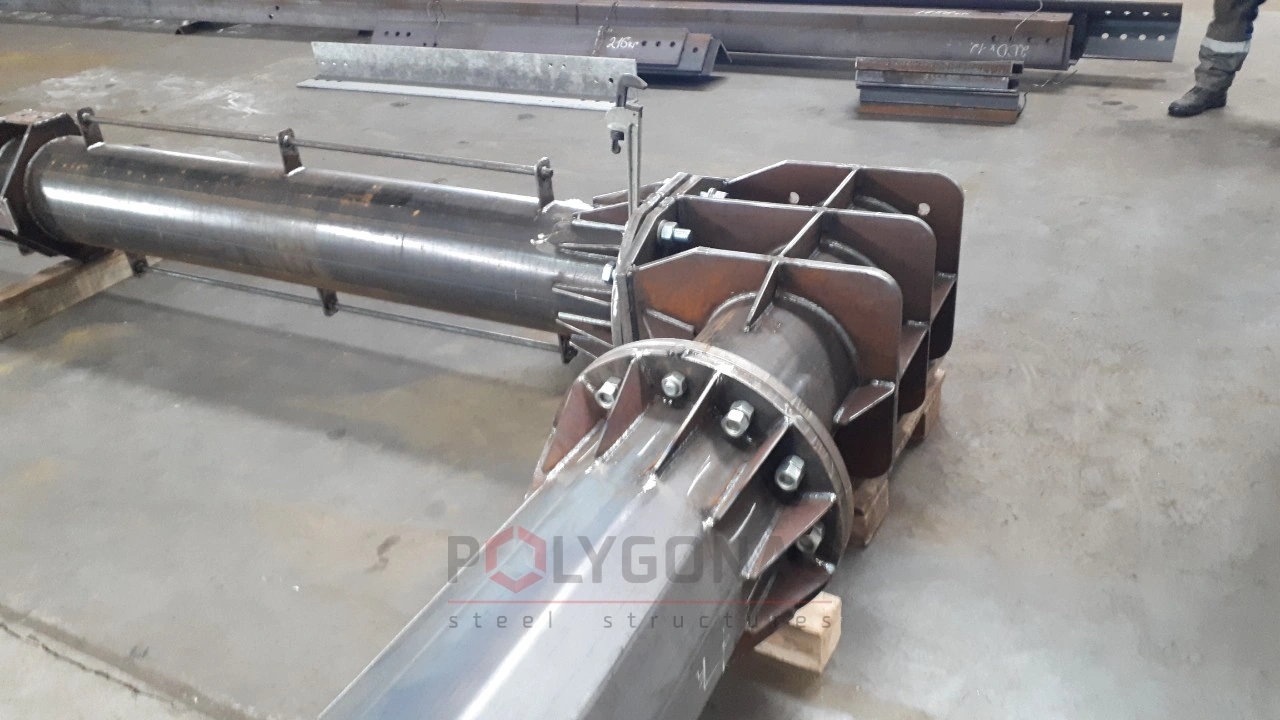 Control assembly of a 150 kV switchyard gantry in the workshop: a bolted flange joint