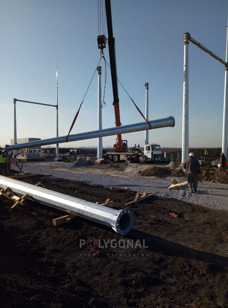 Lifting a gantry post with a crane