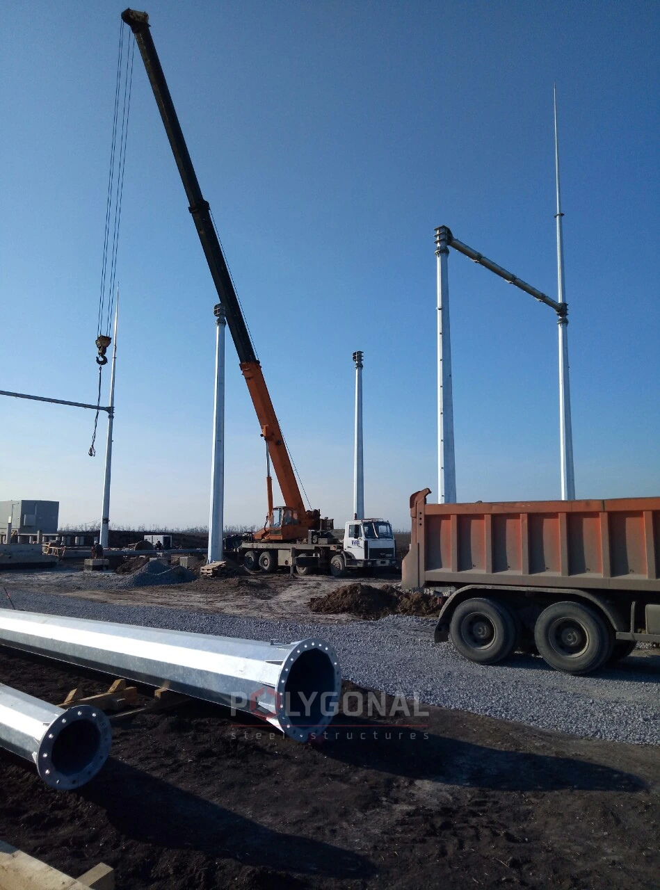 Post sections and the crane on site