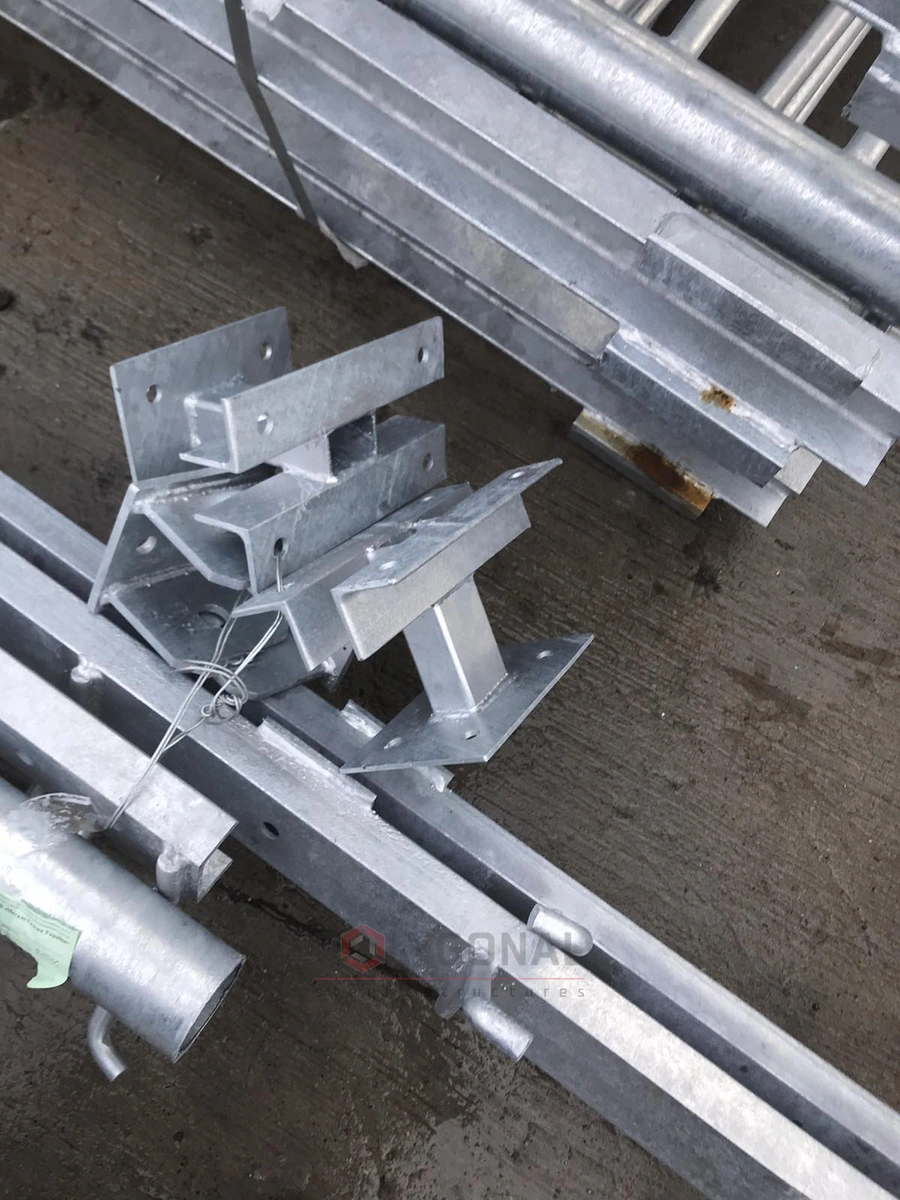 Mounting brackets after hot-dip galvanising in the finished-goods warehouse